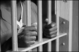 prisoner in cell